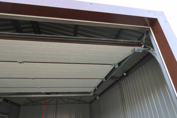 istock Open, raised up automatic garage door, iron structure and walls 2051484451