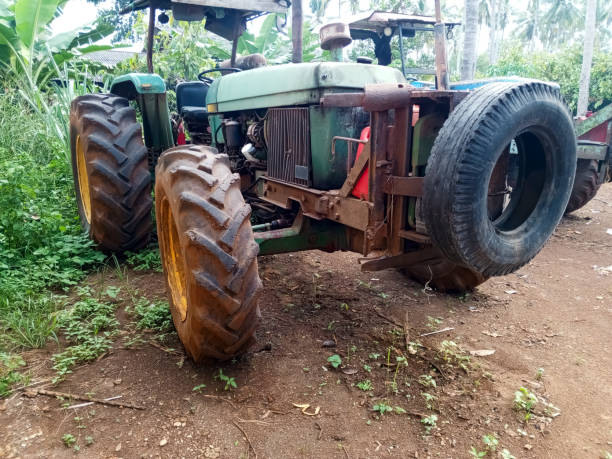 istock side corner view of old machine tractor parked 2051592579