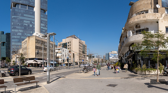 TEL AVIV, ISRAEL-February 2024: Street scene in sunny day in Tel Aviv, Israel. Panoramic view.