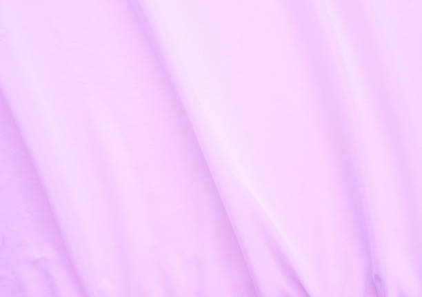 istock Purple Fabric Background Silk Cloth Satin Luxury Backdrop Texture Curtain Pattern Soft Light Color Wave Silky Linen Abstract Smooth Material Banner Design Fashion Mockup Product Cosmetic Beauty. 2051609846