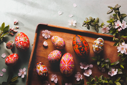 Hand painted easter eggs with almond blossom