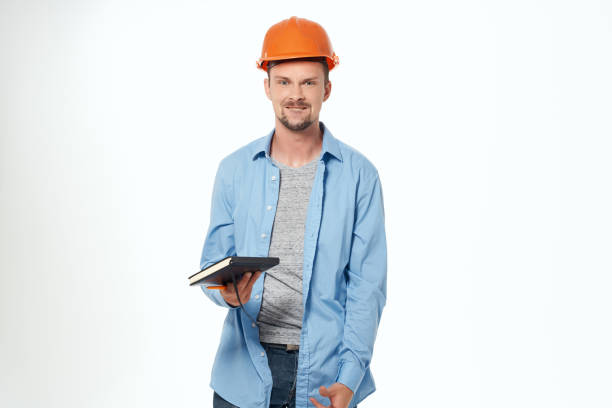 istock man in construction uniform Professional Job isolated background 2051639247