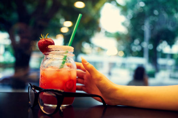 istock cocktail with a straw close-up leisure restaurant summer communication 2051709582