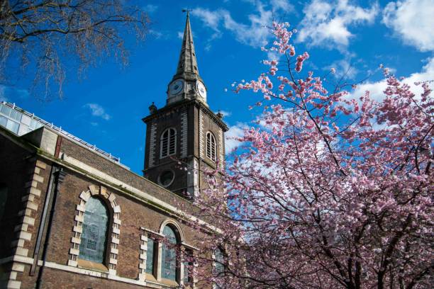 istock Aldgate Church with Cherry blossoms 2051742711