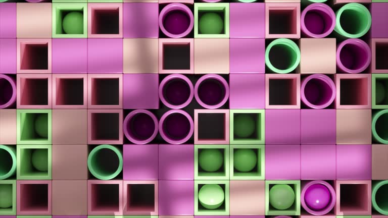 Vivid spheres nestled in a grid of pink and green create a playful, dynamic 3D visual.