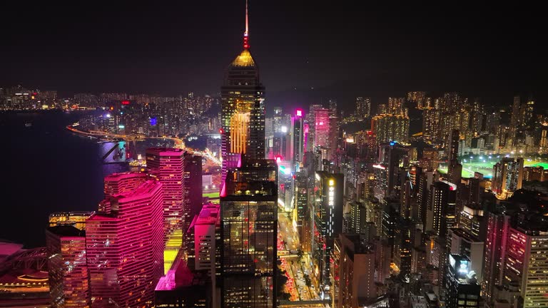 Aerial View of Hong Kong City and Victoria Harbour at night