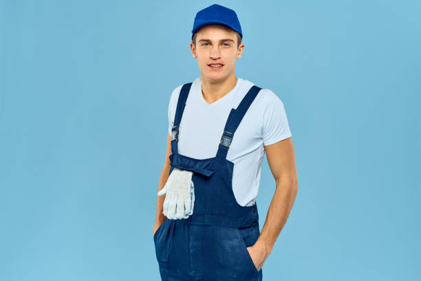 istock Working man in uniform of gloves loader rendering service blue background 2051875665