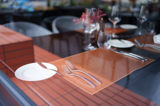 Beautifully decorated small outdoor restaurant tables in the city of Lerici, La Spezia, Italy