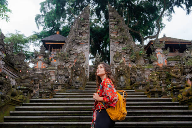 istock Woman exploring Balinese temple 2052097875