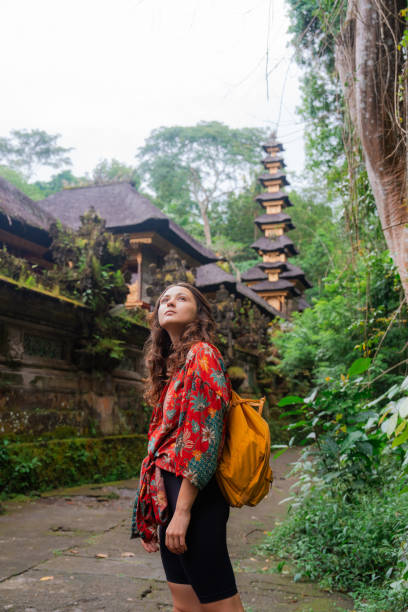 istock Woman exploring Balinese temple 2052101473