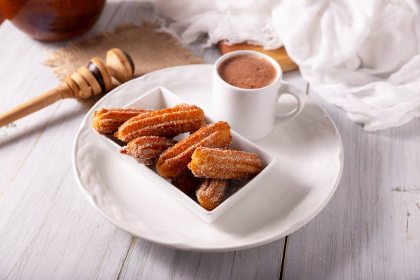 istock traditional churros and hot chocolate recipe 2052136442