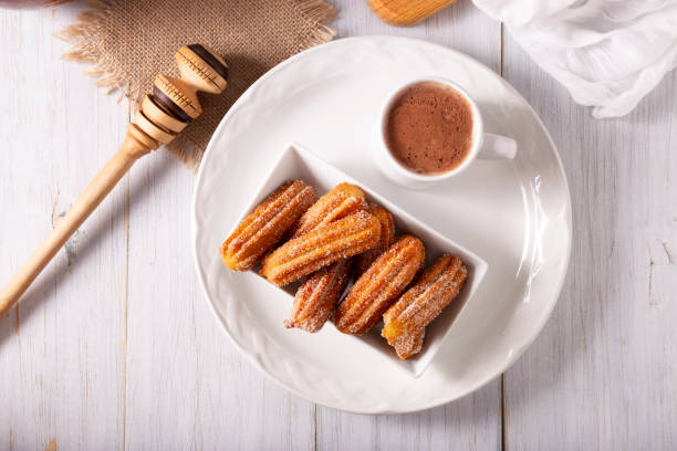 istock traditional churros and hot chocolate topview 2052143279