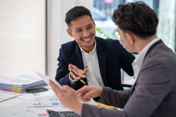 istock Business planning, office trainee, cooperate work with colleague, Office worker discussing work plan of marketing 2052170135