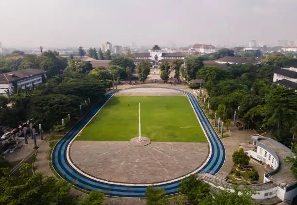 Aerial view of Gedung Sate and Gasibu Square. Two landmarks and icons of the city of Bandung. Famous tourist destination in Bandung City, Indonesia.