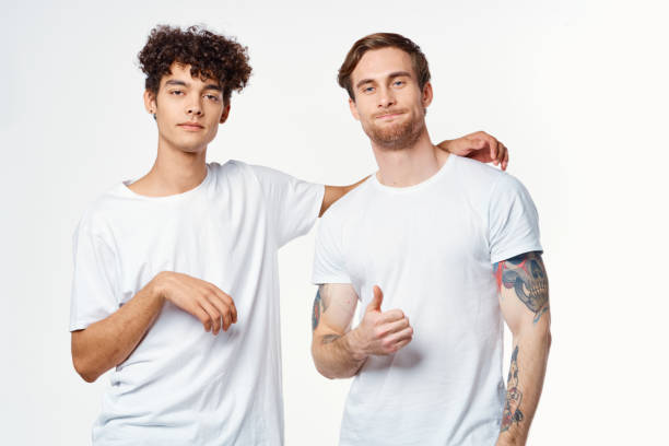 istock two guys in white t-shirts next to friendship communication emotions 2052321928