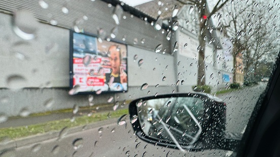 Marbach, Germany - March, 1st - 2024: Rainy day seen out of a car.