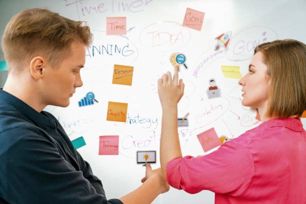 istock Creative business team brainstorm about marketing strategy. Closeup. Immaculate. 2052327204
