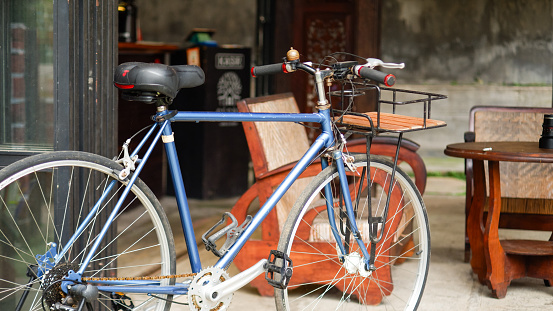 an old bicycle in a terrace near with living room