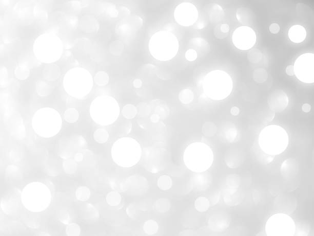 istock Bokeh Background Light Glow White Blur Party Celebrate Texture Abstract Effect festive Blurry Holiday Effect Glitter Silver Grey Dreamy Soft Pattern Luxury Mockup Season Winter Summer Backdrop Magic. 2052393879