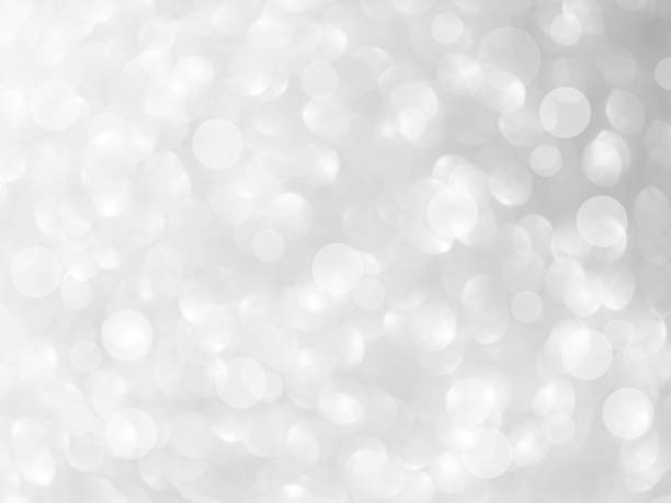 istock Bokeh Background Light Glow White Blur Party Celebrate Texture Abstract Effect festive Blurry Holiday Effect Glitter Silver Grey Dreamy Soft Pattern Luxury Mockup Season Winter Summer Backdrop Magic. 2052394056
