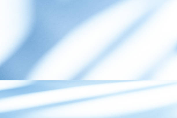 istock Wall interior background, studio, and backdrops show products. with shadow from window color white and blue light. background for text insertion and presentation of product 2052428106