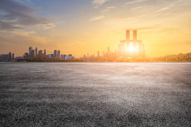 istock Empty asphalt road and city skyline background 2052482257
