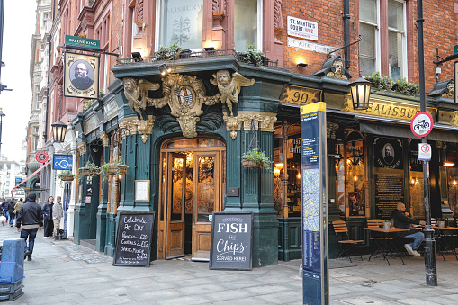 St. Martin's Lane Covent Garden London, England, United Kingdom, Great Britain - February 28th, 2024: The Salisbury, a picturesque pub on Saint Martin's Lane Street.