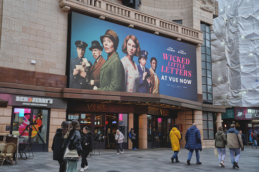 Central London, England, United Kingdom, Great Britain - February 28th, 2024: The Hippodrome Casino Live Entertainment Venue in Leicester Square and the Vue Movie Theater. Olivia Colman and Jessie Buckley are seen in the drama movie \