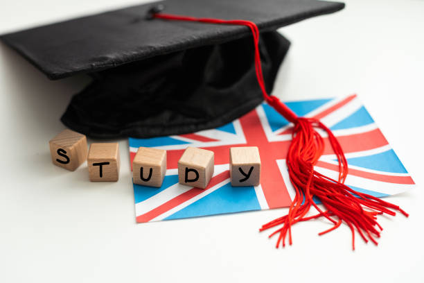 istock Graduation gap hat and wooden cubes, Education study testing learning teach concept. 2052527068