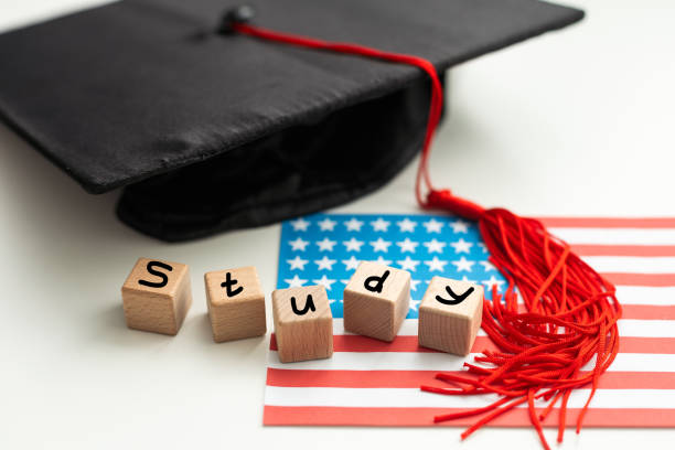 istock Graduation gap hat and wooden cubes, Education study testing learning teach concept. 2052527584
