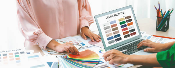 istock Interior designer choose appropriate color from color palette. Variegated 2052546781