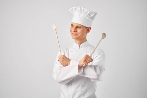 istock cook with kitchen utensils professional work in a restaurant 2052577484