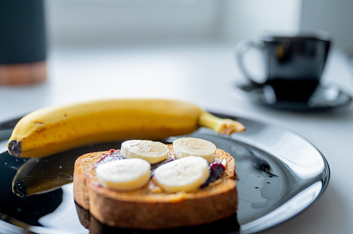 Well-balanced morning: A nutritious breakfast spread with a banana and whole-grain bread
