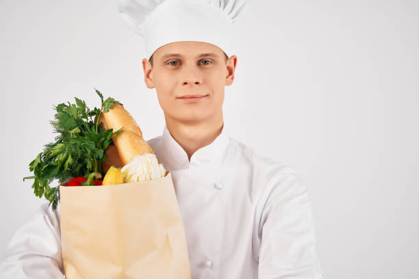 istock man with grocery package service delivery supermarket work 2052582939