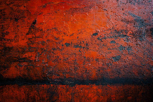 Old red metal sheet with rust and oil in the garage can be use as background ストックフォト