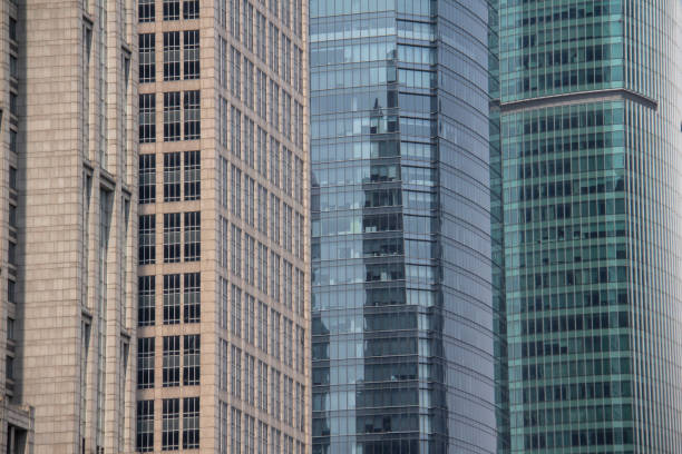 The city of Shanghai has many tall towers, as well as shapes with different architecture, photography of the pattern of the structure and the icons of the windows of different towers in the city of Shanghai, China