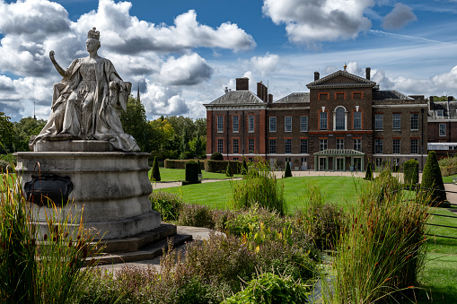 London, United Kingdom - 28.August 2023: Kensington Palace and Statue of Queen Victoria