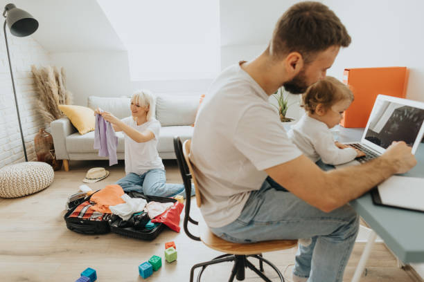 istock Happy family preparing for summer vacation 2052684206