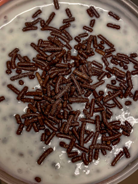istock Chocolate sprinkles with milk in a bowl, close-up 2052713120