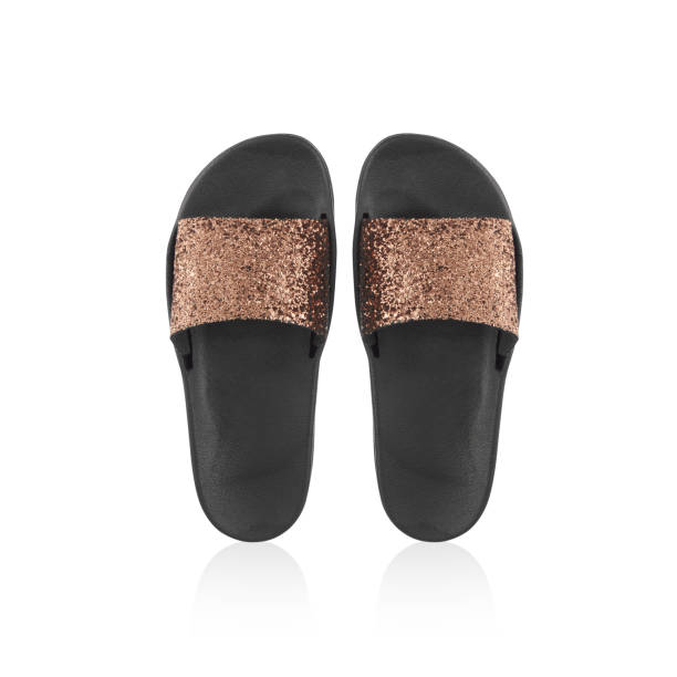 Top View Of Slippers Over White Background