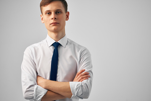 man in shirt with tie posing office work. High quality photo
