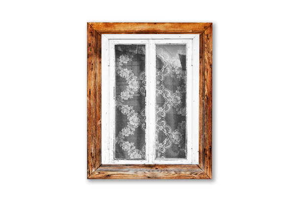 Countryside architecture texture. Window frame with lace curtains.