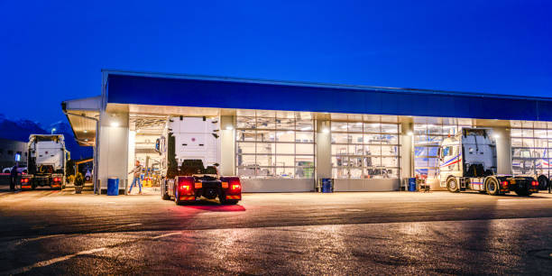 istock Garage for maintenance of trucks 2052758799