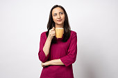 Photo of young happy cheerful positive girl drink coffee isolated on white color background stock photo