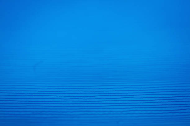 Macro shot of blue marbled vinyl record. Surface of an old vinyl record. Shallow depth of field.
