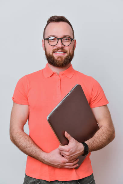istock Portrait Of Smiling Male Software Developer And His Laptop 2052852963