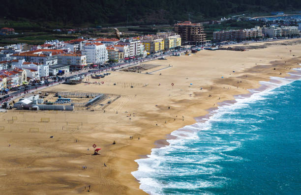 istock Top view of ocean sandy shore and waves. 2052942539