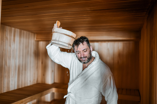 Cold Water Therapy After Sauna For Bearded Male