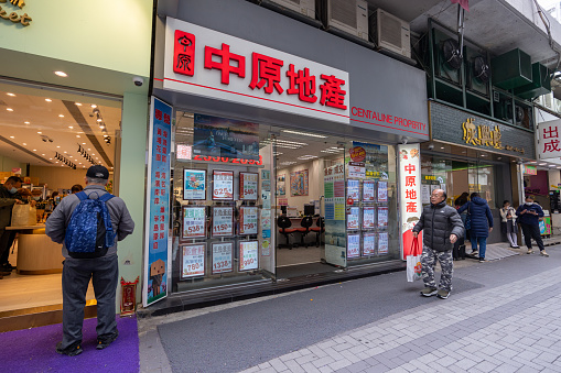 Hong Kong - March 2, 2024 : A property agency store in Whampoa residential district in Hung Hom, Kowloon, Hong Kong.