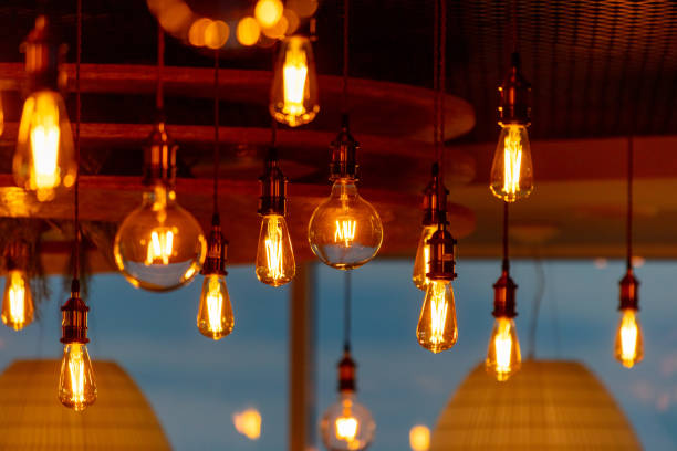 istock Decorative antique edison style filament light bulbs hanging from ceiling 2052993318